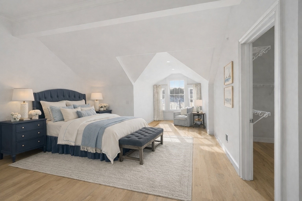 206 West Main Street, Unit 9 Georgetown, MA 01833 - Photo 16 of 25 a spacious bedroom with a bed couch and a view of bedroom