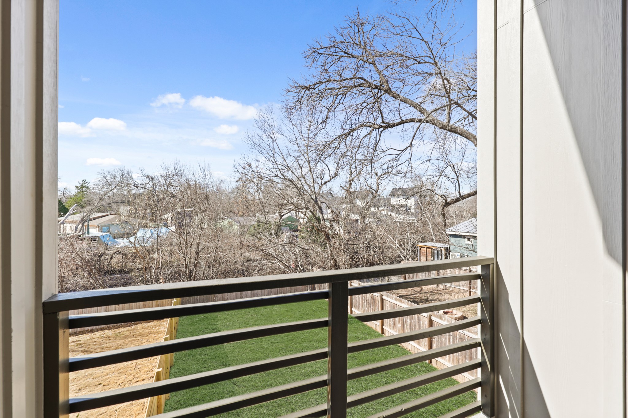 4801 Sara Drive, Unit B Austin, TX 78721 - Photo 19 of 40 a view of a glass door and a window