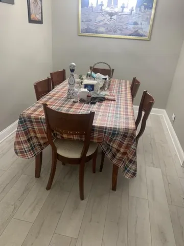 a view of a dining room with furniture