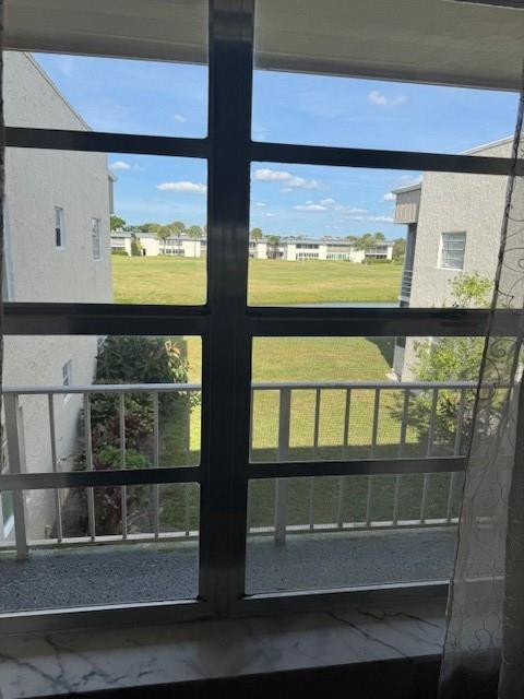 522 Flanders P, Unit 522 Delray Beach, FL 33484 - Photo 2 of 11 a view of a glass door with a window