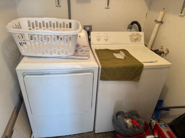 522 Flanders P, Unit 522 Delray Beach, FL 33484 - Photo 8 of 11 a view of washer and dryer