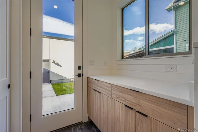 a view of a kitchen from a window