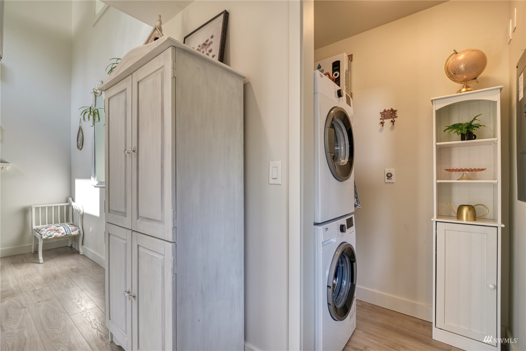 408 South Beach Road Point Roberts, WA 98281 - Photo 11 of 25 a view of a storage and utility room with washer and dryer