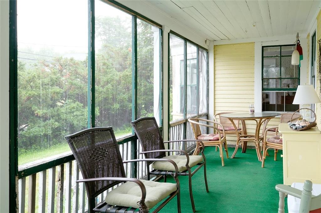 755 Shore Road Cape Neddick, ME 03902 - Photo 18 of 35 The large porch is a wonderful in...