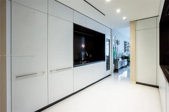 a view of hallway with walk in closet