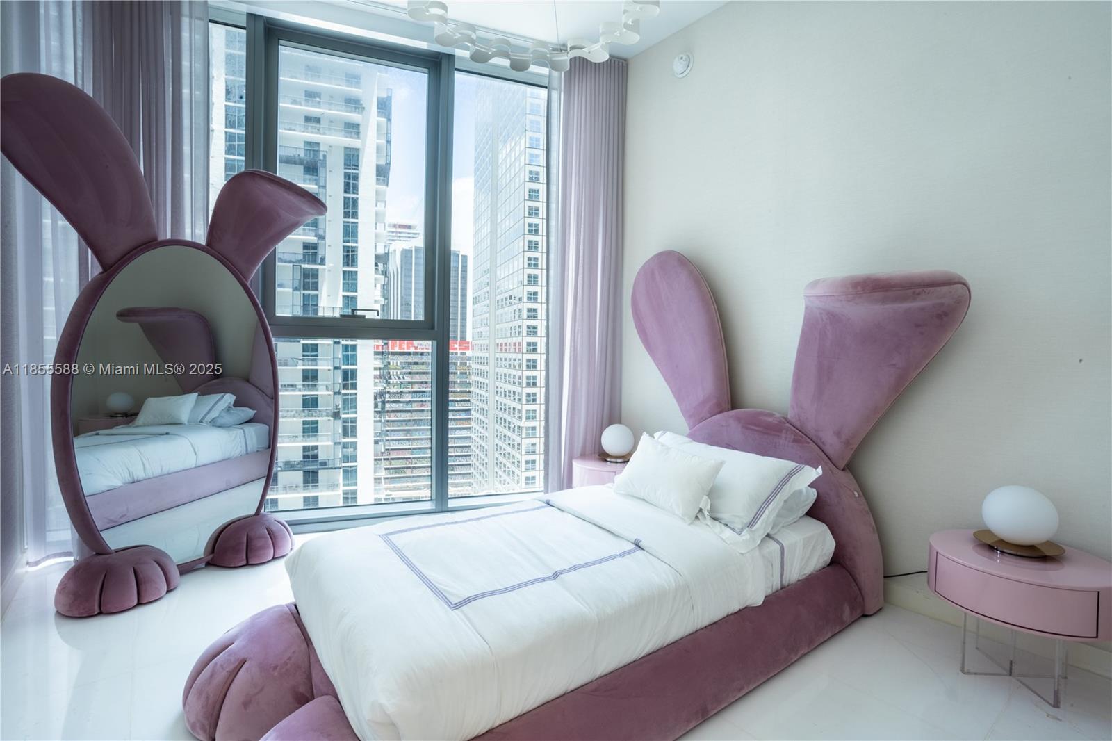 300 Biscayne Blvd Way, Unit 2203C Miami, FL 33131 - Photo 18 of 30 a bedroom with bed and a large window