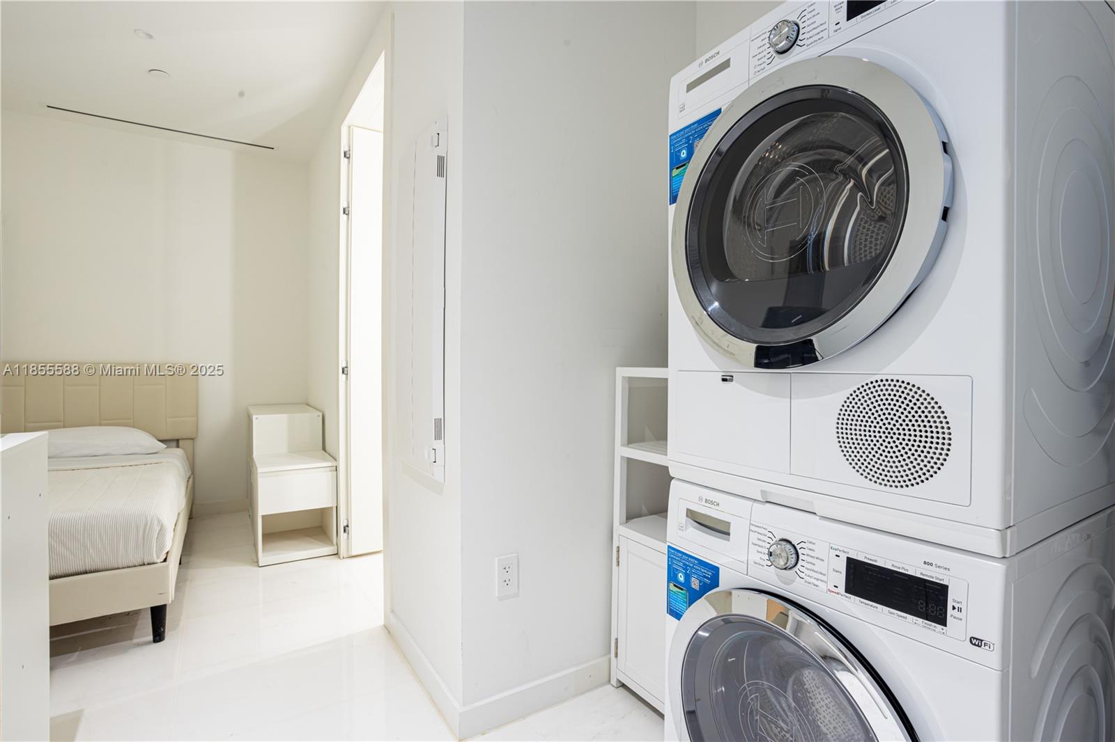 300 Biscayne Blvd Way, Unit 2203C Miami, FL 33131 - Photo 26 of 30 a utility room with dryer and washer