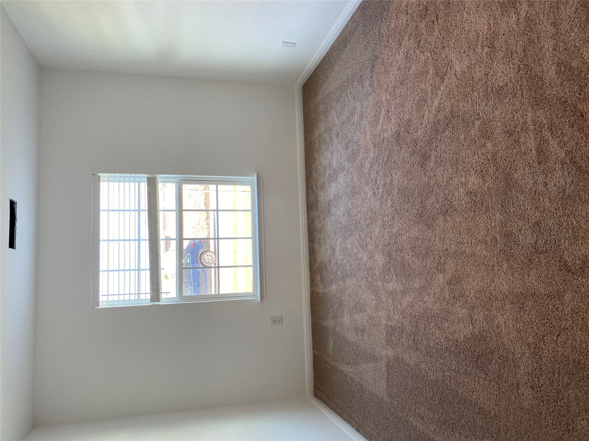 18308 Speculator Lane Elgin, TX 78621 - Photo 11 of 16 an empty room with a window