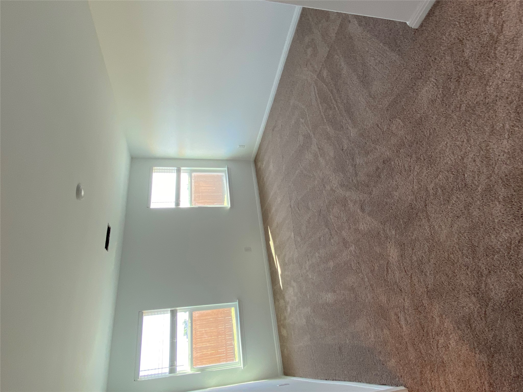 18308 Speculator Lane Elgin, TX 78621 - Photo 14 of 16 a view of an empty room with a window