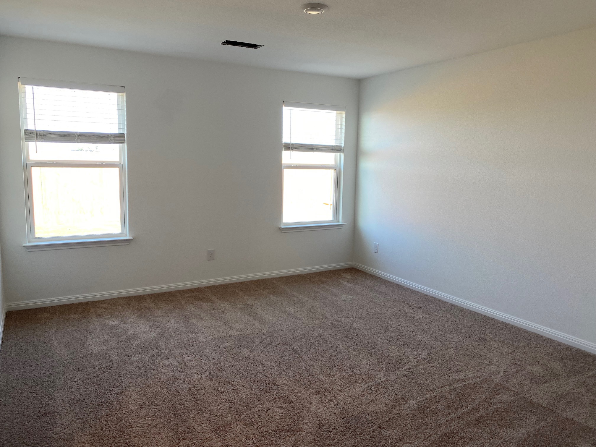 18308 Speculator Lane Elgin, TX 78621 - Photo 5 of 16 an empty room with a window