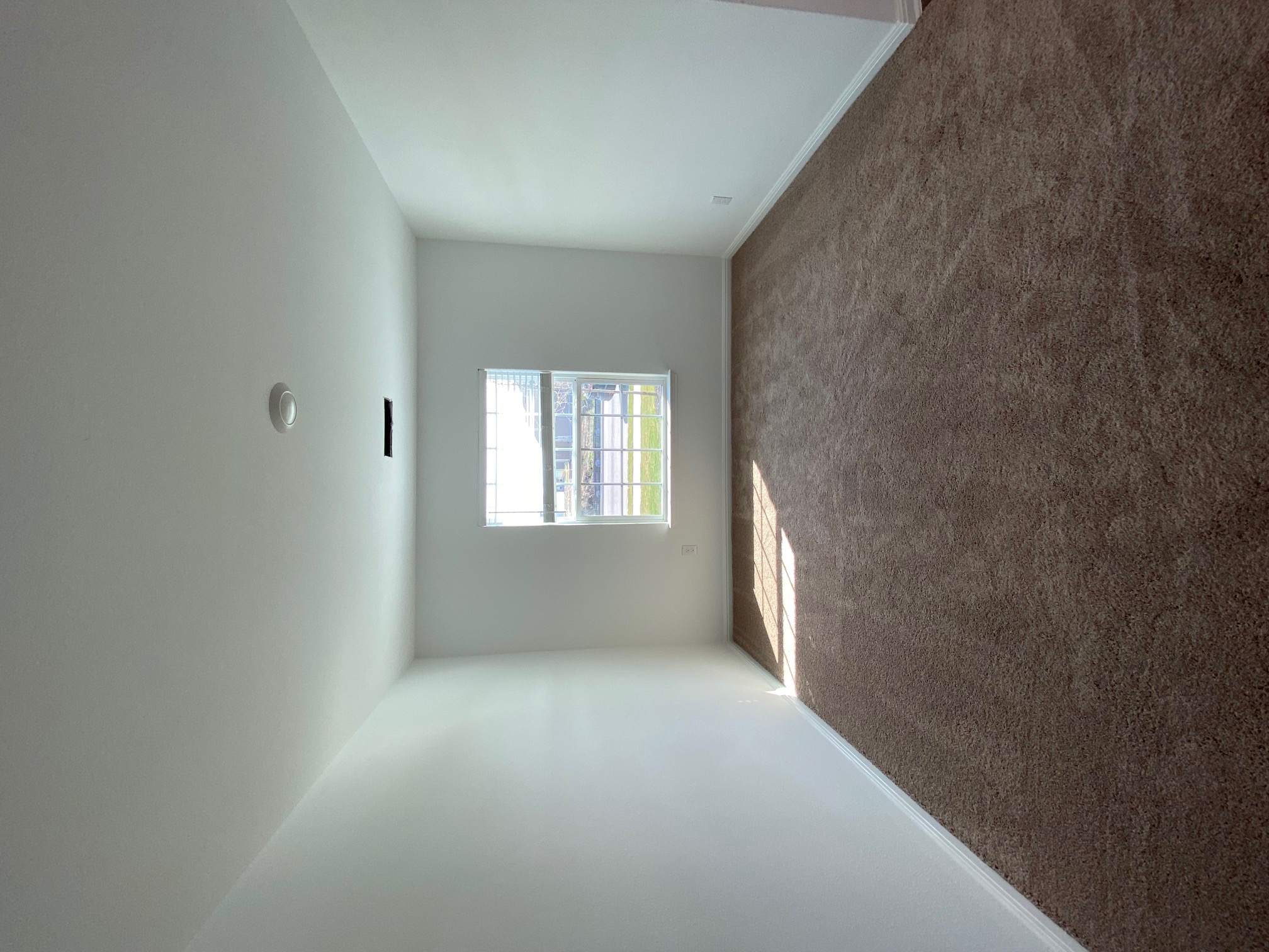 18308 Speculator Lane Elgin, TX 78621 - Photo 10 of 16 an empty room with a window