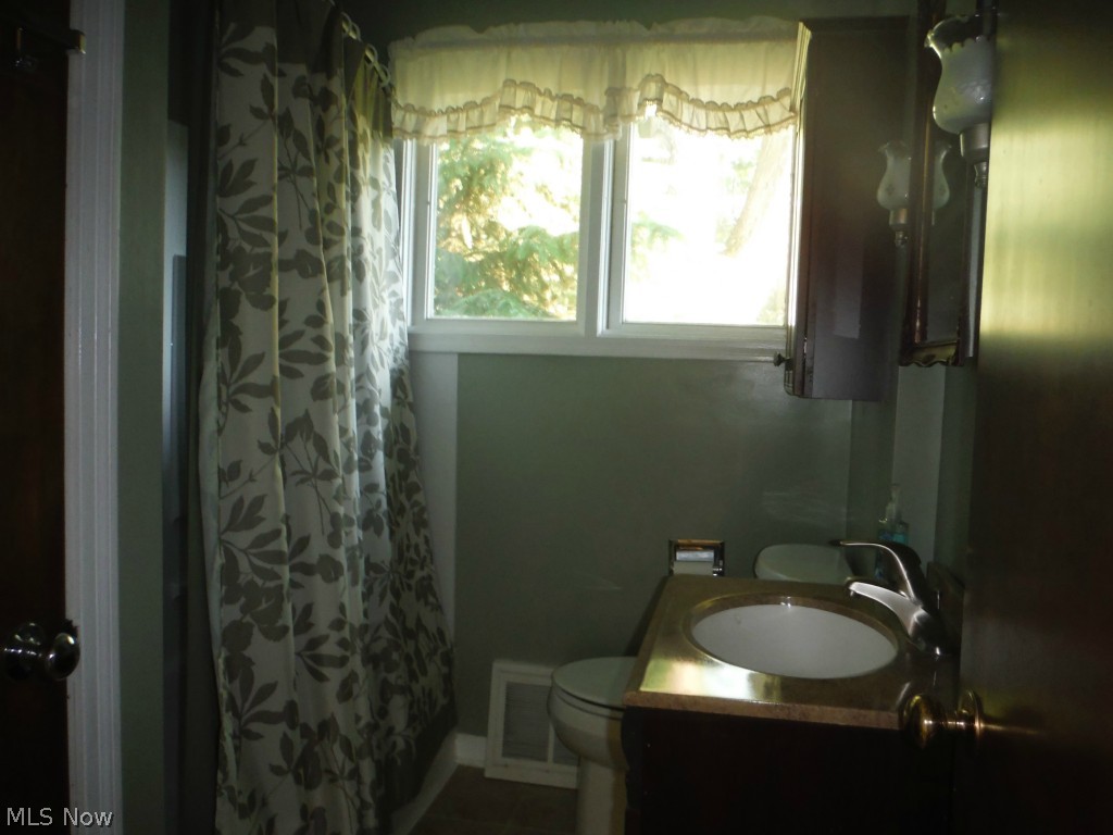 140 Far View Road Southwest North Canton, OH 44720 - Photo 8 of 25 Updated first floor full bath