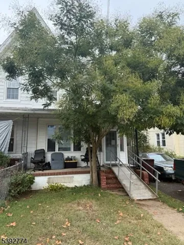 a view of a house with swimming pool