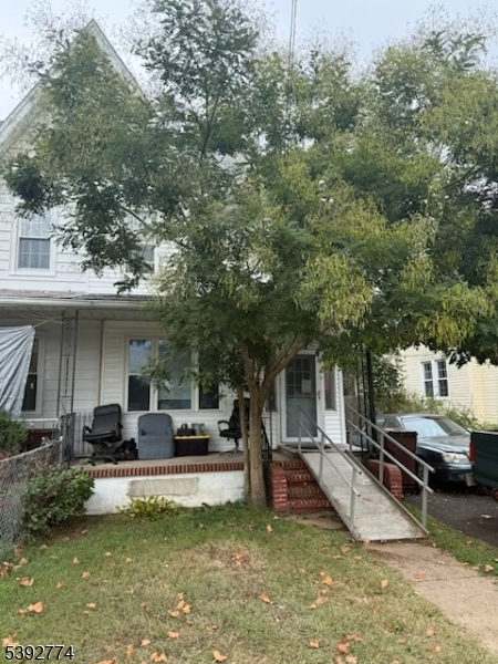 a view of a house with swimming pool