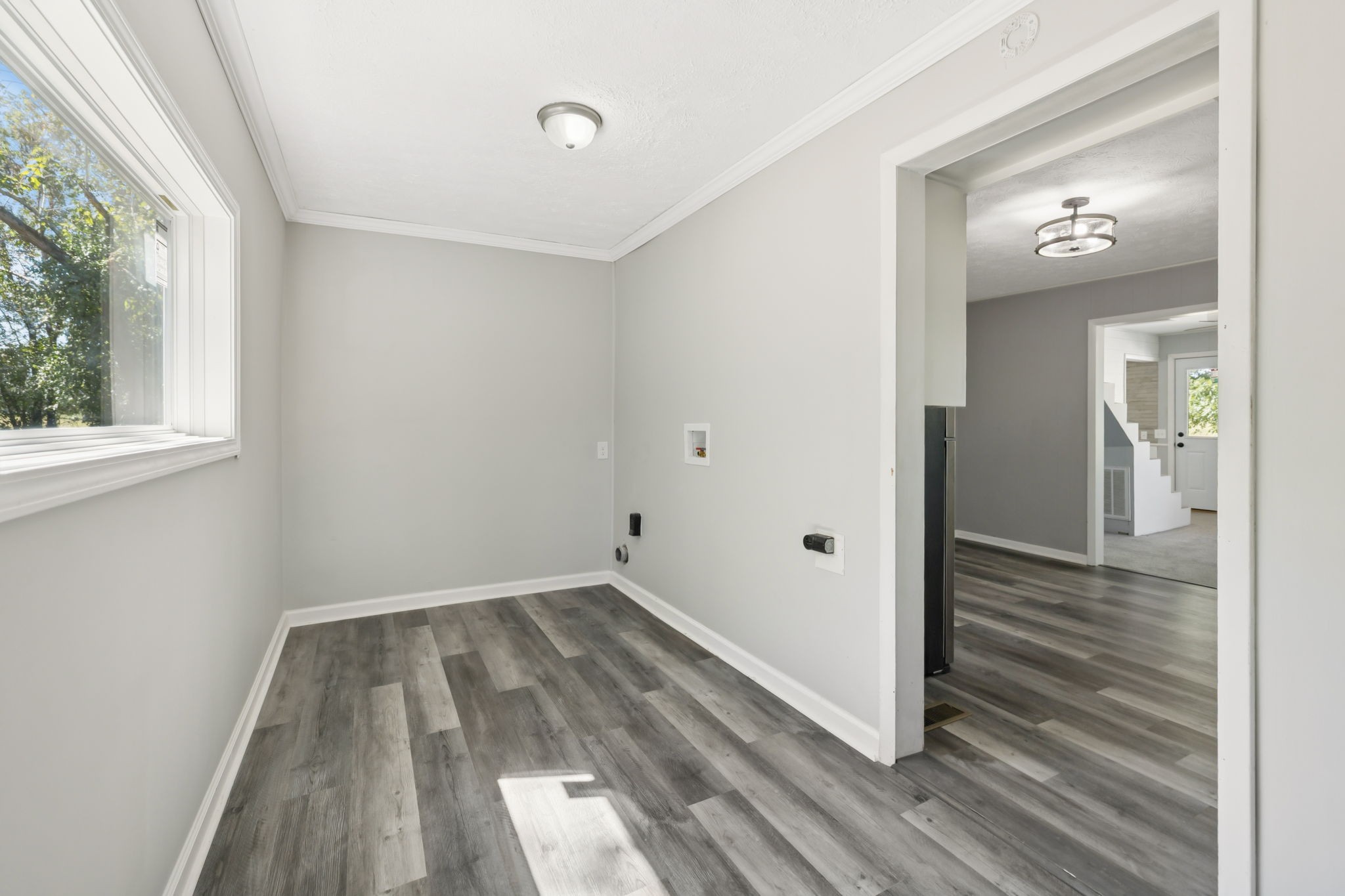 315 Ferguson Hill Road Lafayette, TN 37083 - Photo 18 of 29 a view of a hallway with wooden floor and a window
