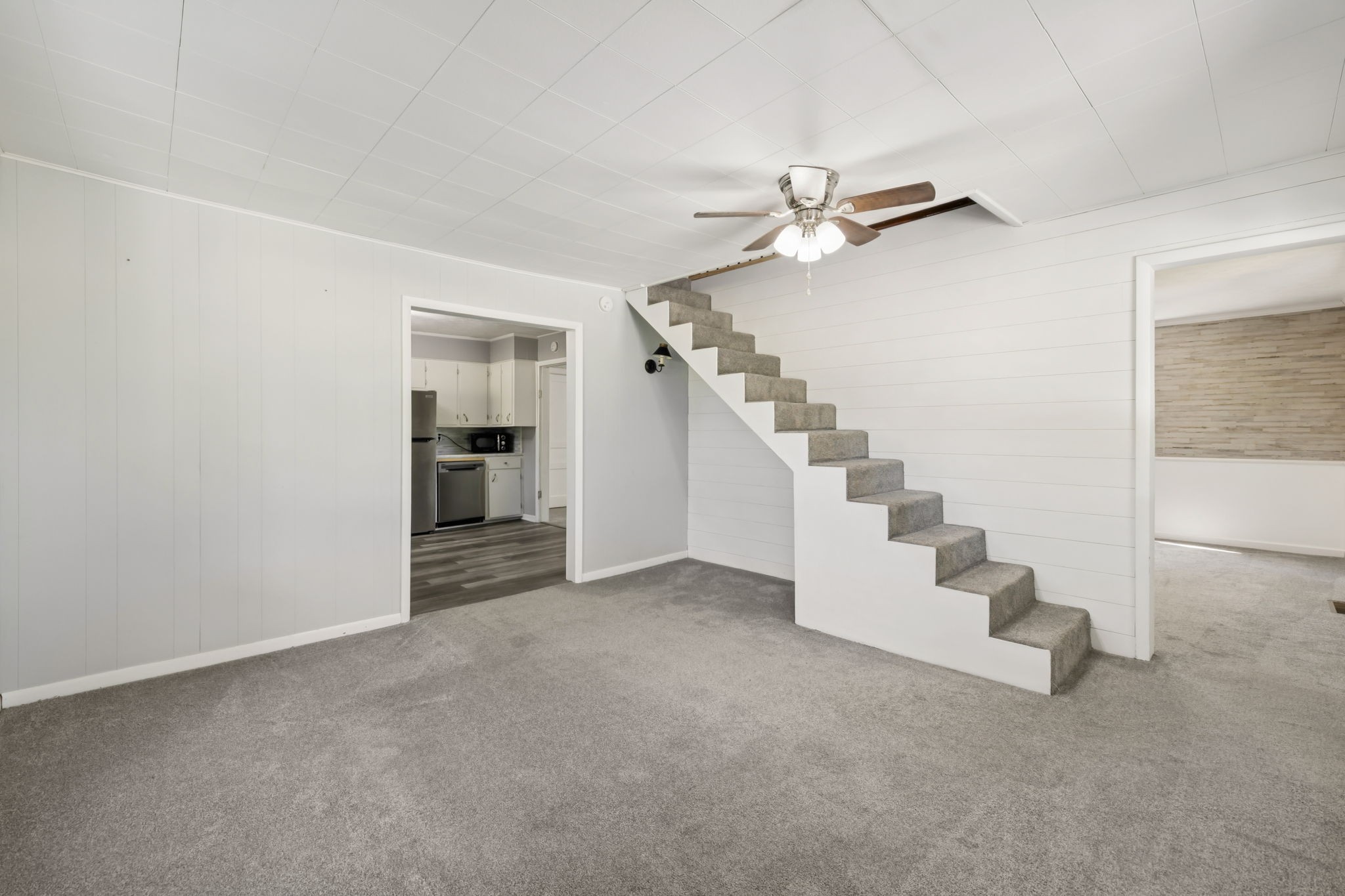 315 Ferguson Hill Road Lafayette, TN 37083 - Photo 3 of 29 a view of an empty room with stairs and white walls