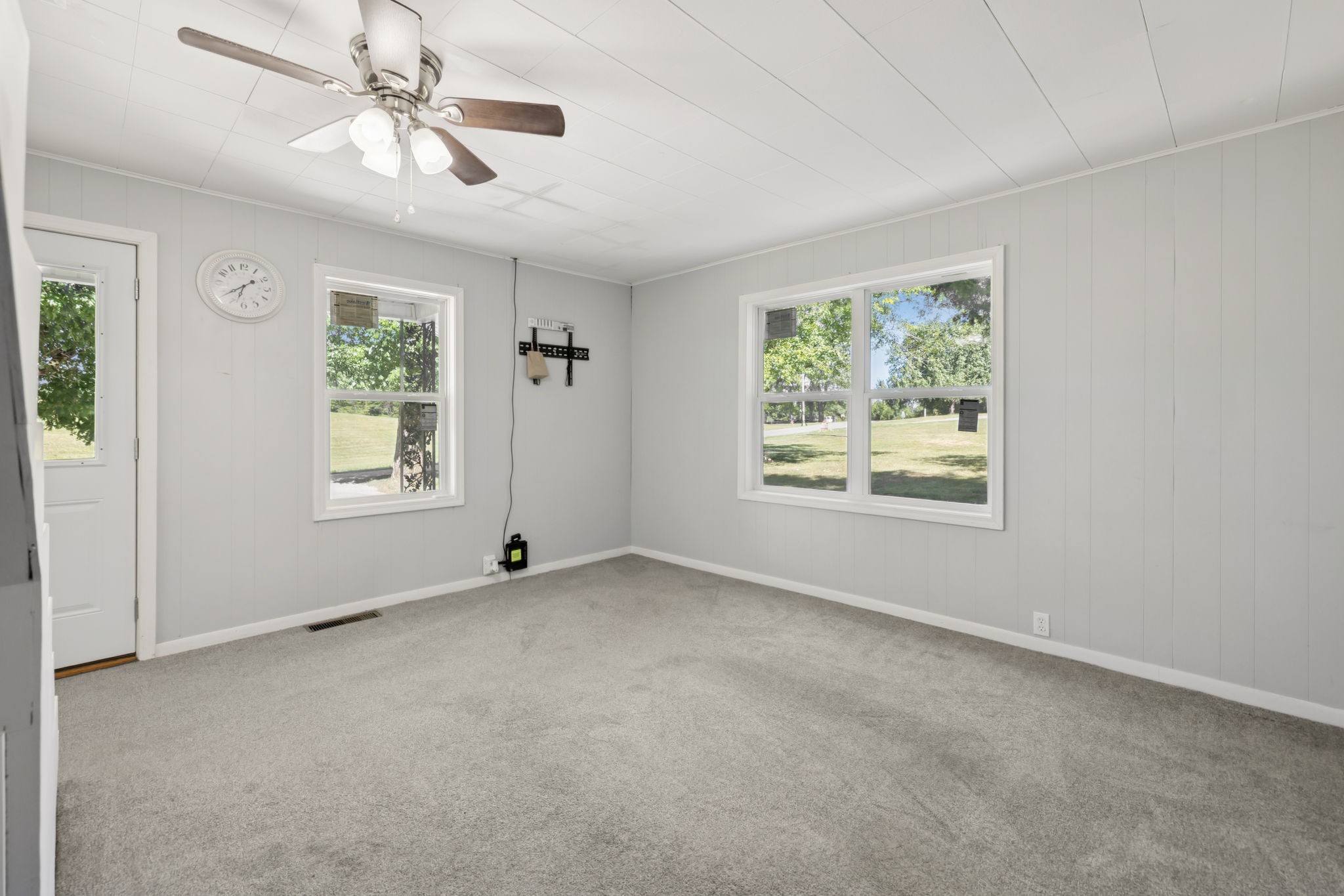 315 Ferguson Hill Road Lafayette, TN 37083 - Photo 5 of 29 an empty room with windows and ceiling fan