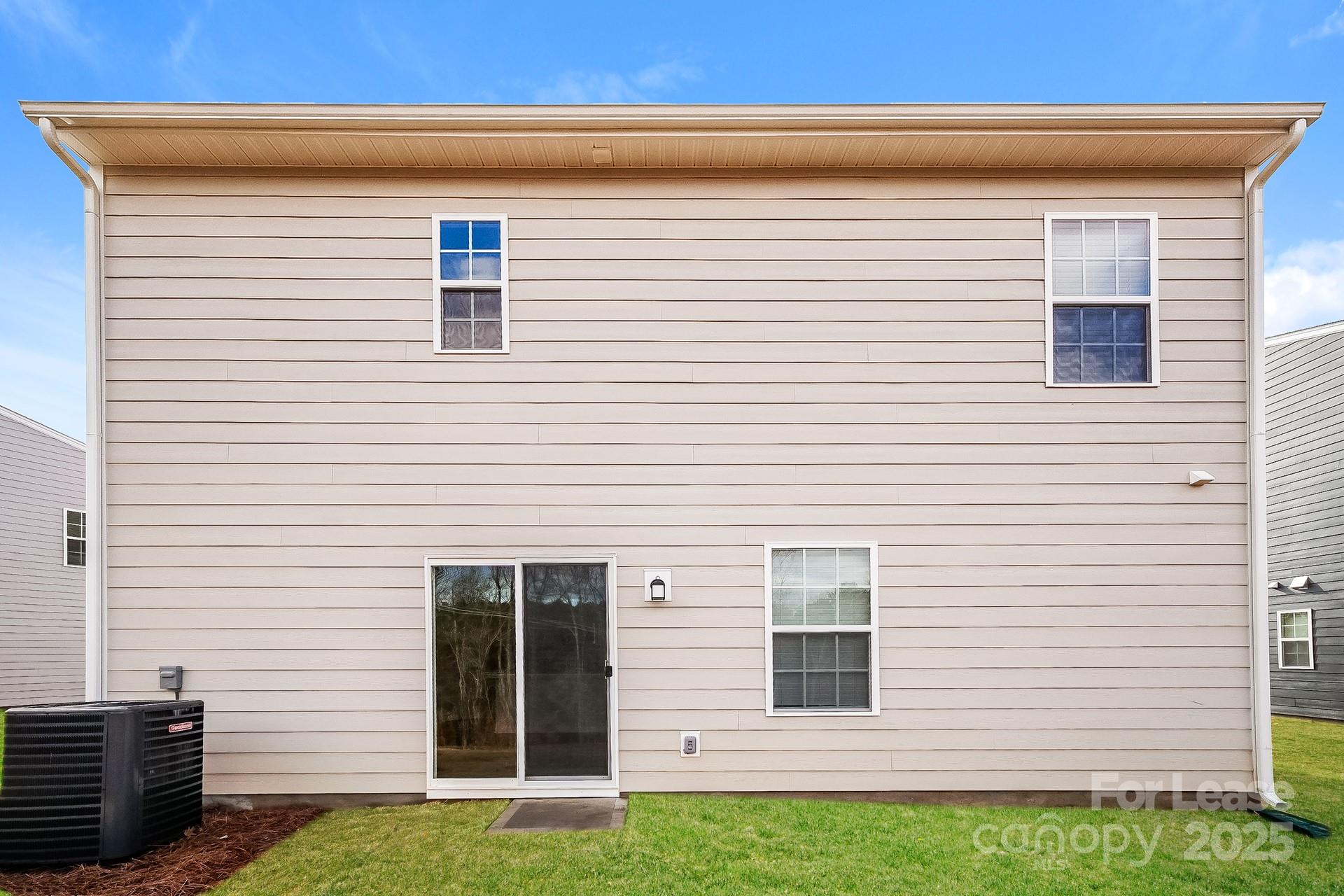 143 Arden Court Troutman, NC 28166 - Photo 17 of 18 a view of a house with a yard