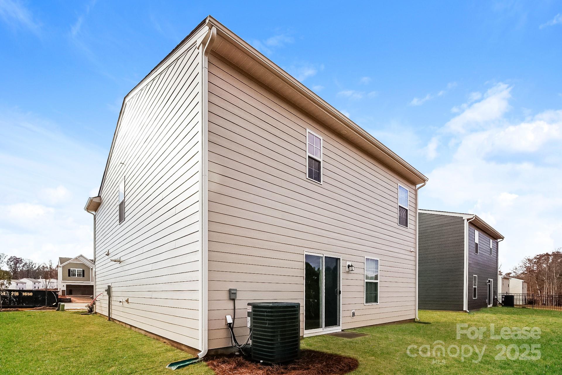 143 Arden Court Troutman, NC 28166 - Photo 18 of 18 a view of a house with a yard