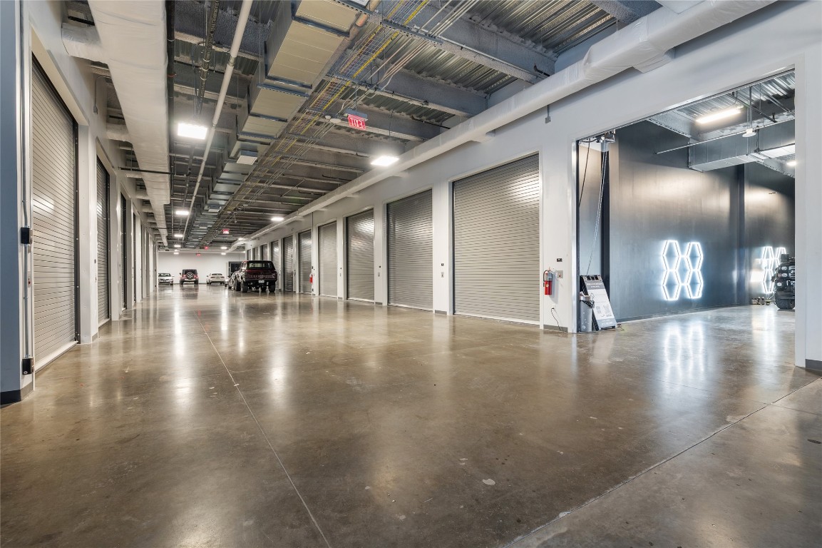 4229 North FM 620, Unit 206 Austin, TX 78734 - Photo 3 of 17 a view of a hall with wooden floor