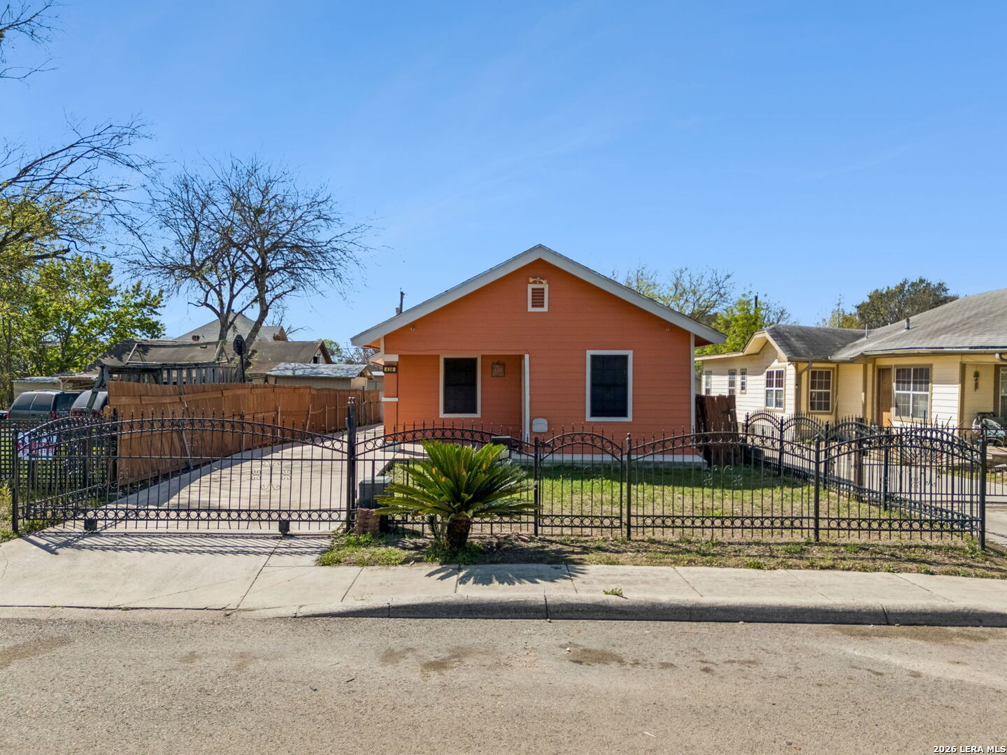 438 Rigsby Avenue San Antonio, TX 78210 - Photo 1 of 25 a front view of a house with a yard
