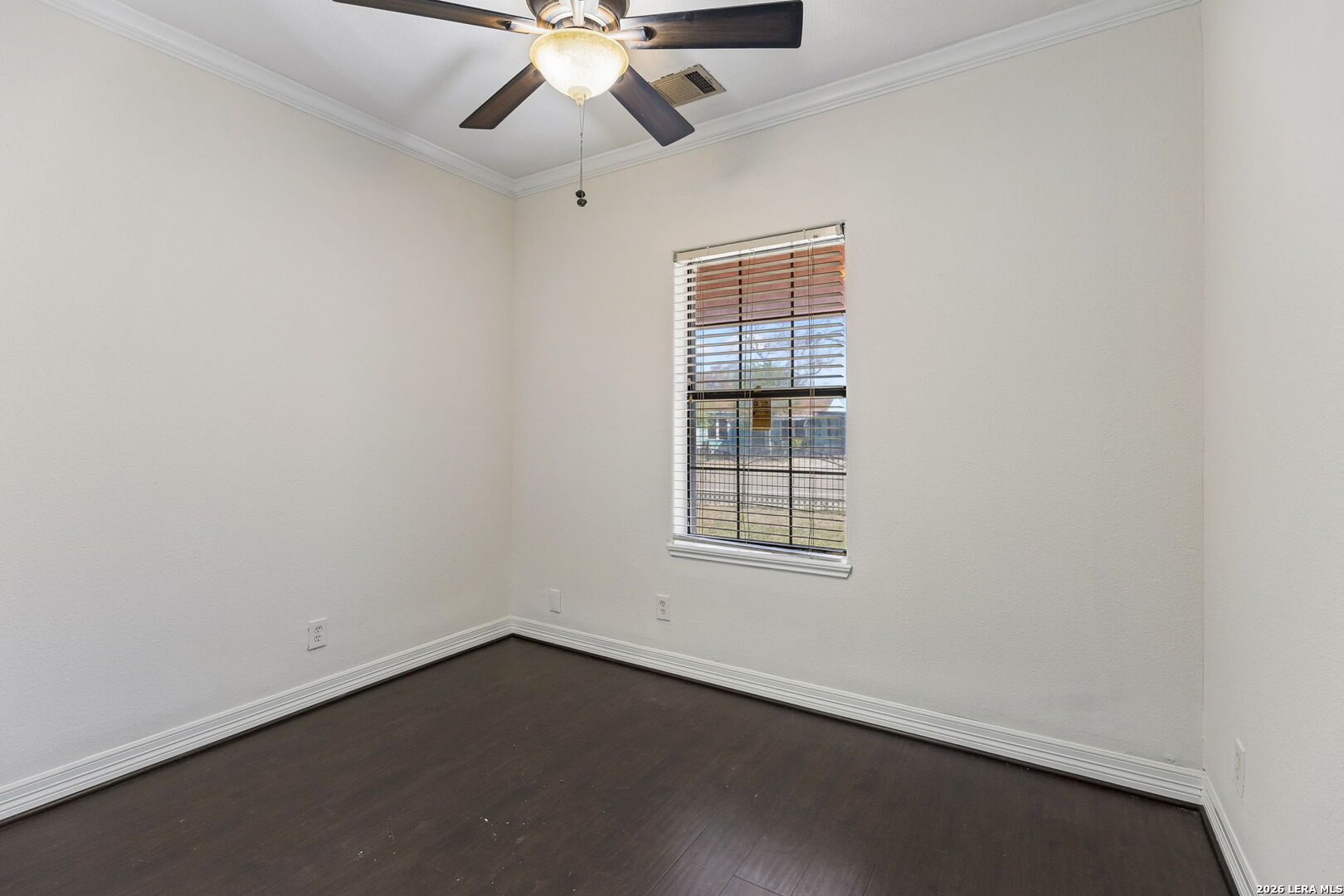 438 Rigsby Avenue San Antonio, TX 78210 - Photo 15 of 25 an empty room with a window