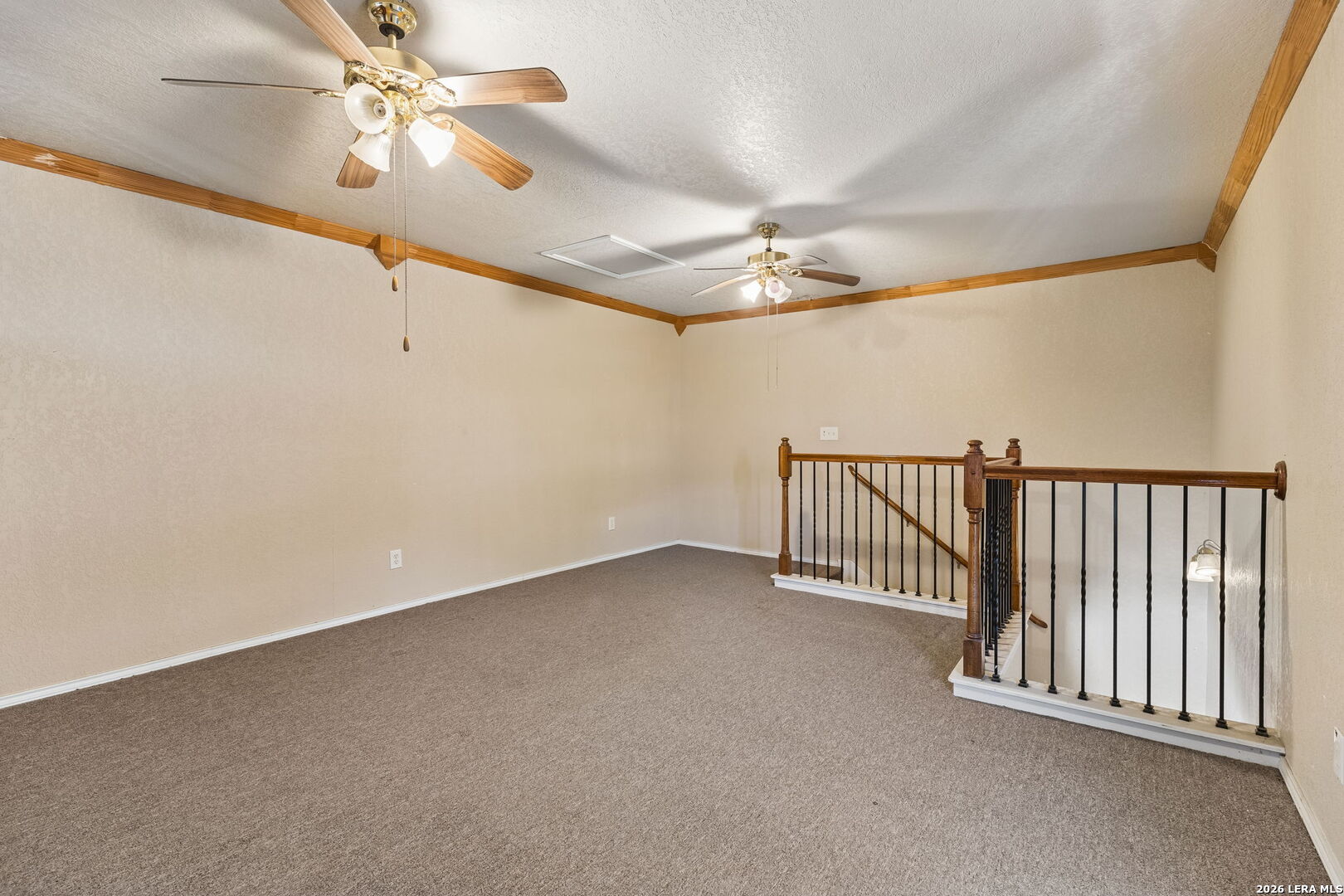 438 Rigsby Avenue San Antonio, TX 78210 - Photo 23 of 25 an empty room with chandelier fan
