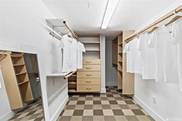 a view of an empty walk in closet