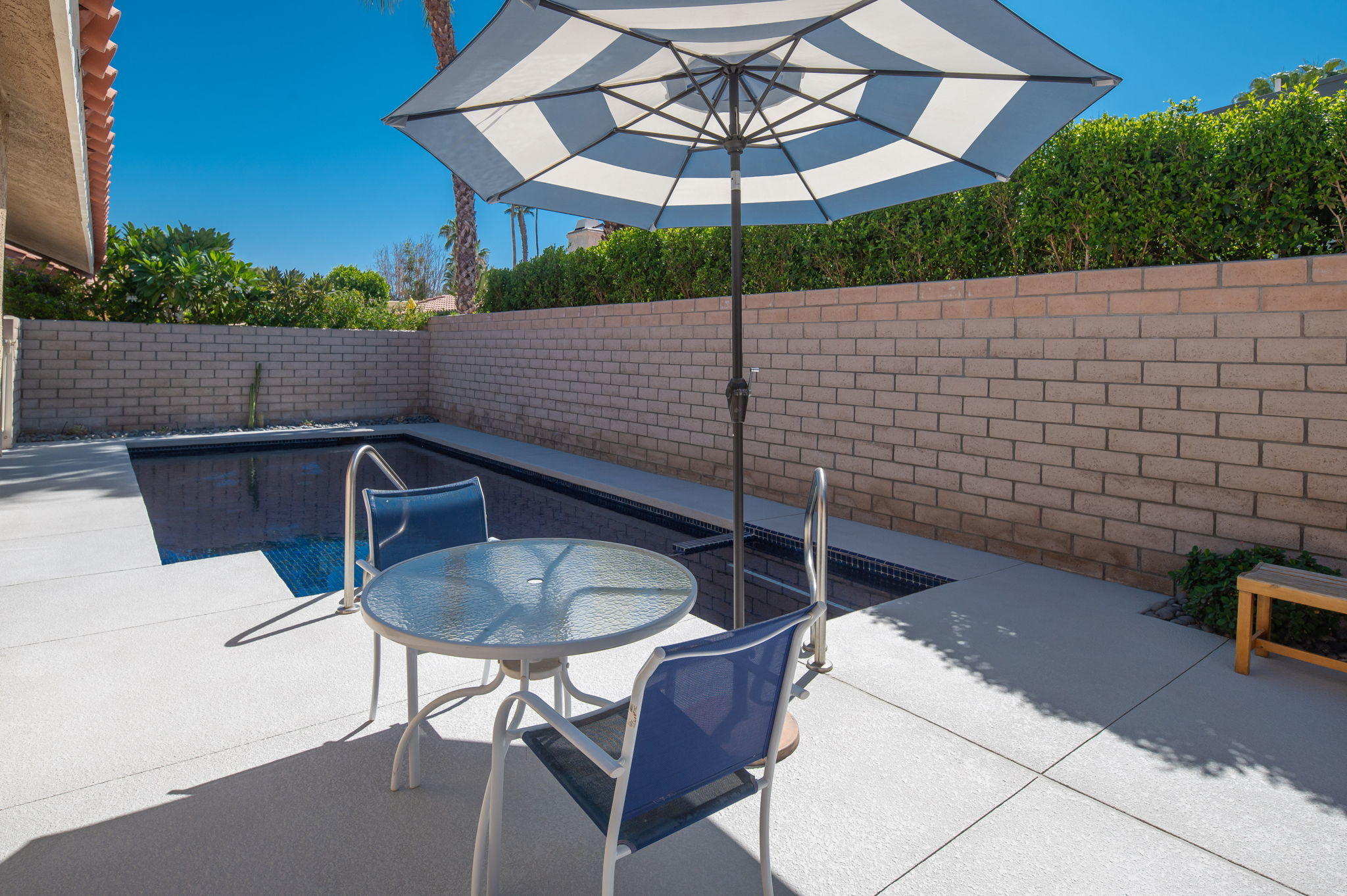 70321 Chappel Road Rancho Mirage, CA 92270 - Photo 14 of 26 a roof deck with table and chairs