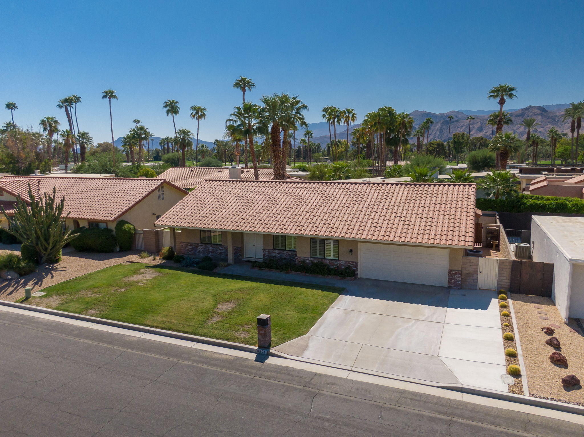 70321 Chappel Road Rancho Mirage, CA 92270 - Photo 3 of 26 a view of a swimming pool and outdoor space