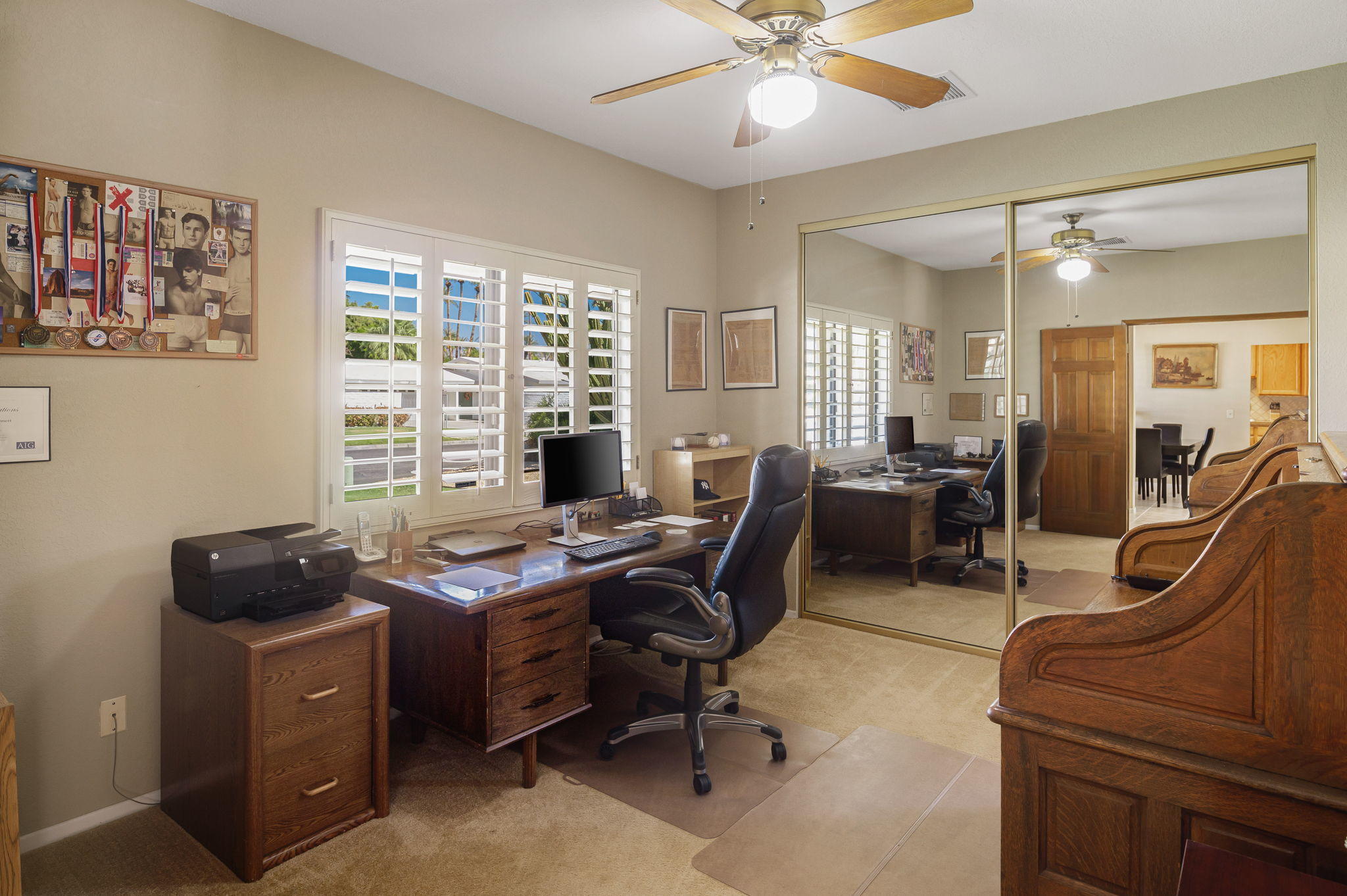 70321 Chappel Road Rancho Mirage, CA 92270 - Photo 22 of 26 a view of a workspace with furniture and a window