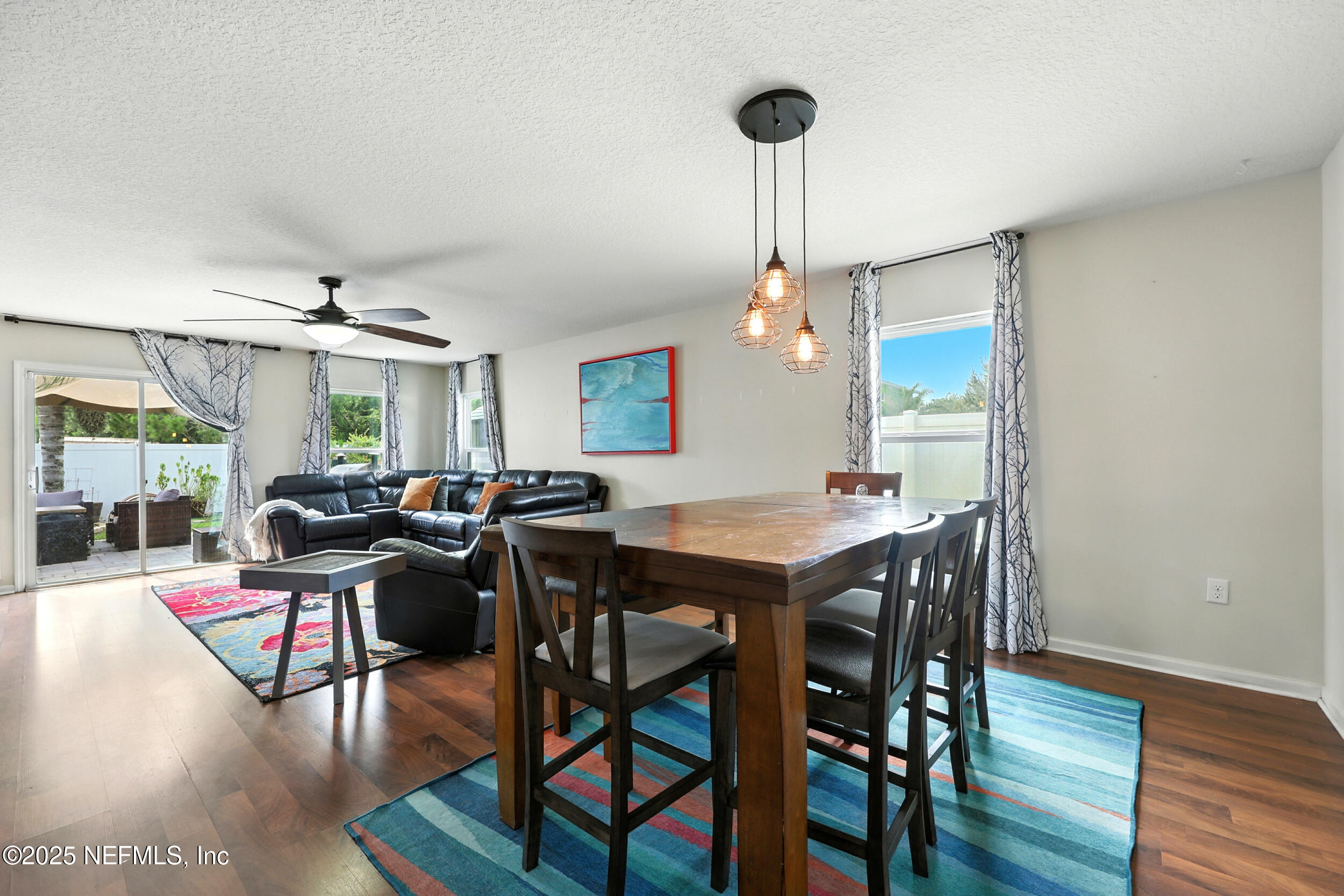 76866 Timbercreek Boulevard Yulee, FL 32097 - Photo 6 of 33 a view of a dining room with furniture window and wooden floor