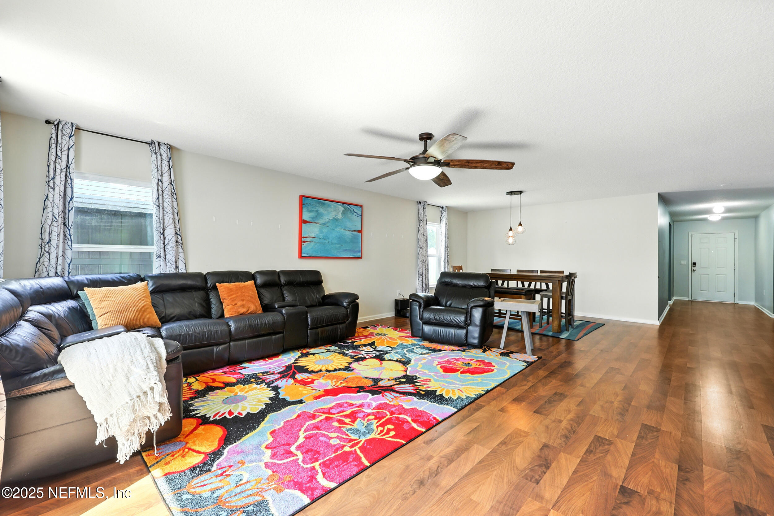 76866 Timbercreek Boulevard Yulee, FL 32097 - Photo 9 of 33 a living room with furniture and a window