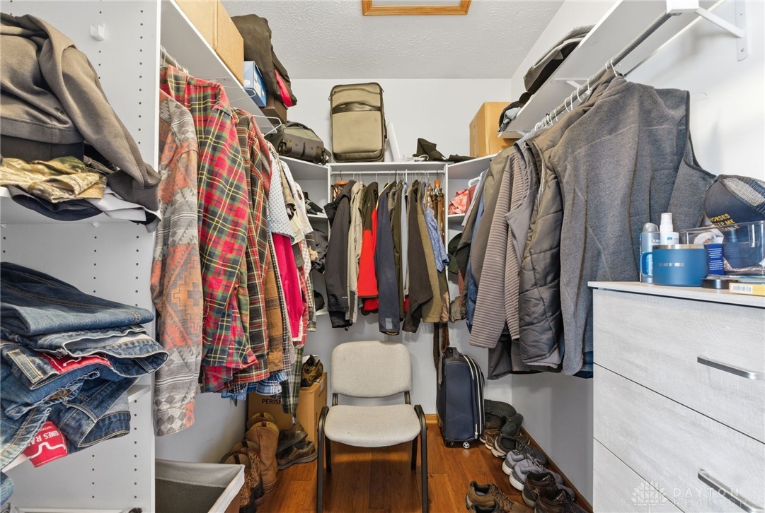 1540 Jasper Road Xenia, OH 45385 - Photo 30 of 91 This organized walk-in closet offers extensive storage solutions, optimizing space for a versatile wardrobe.
