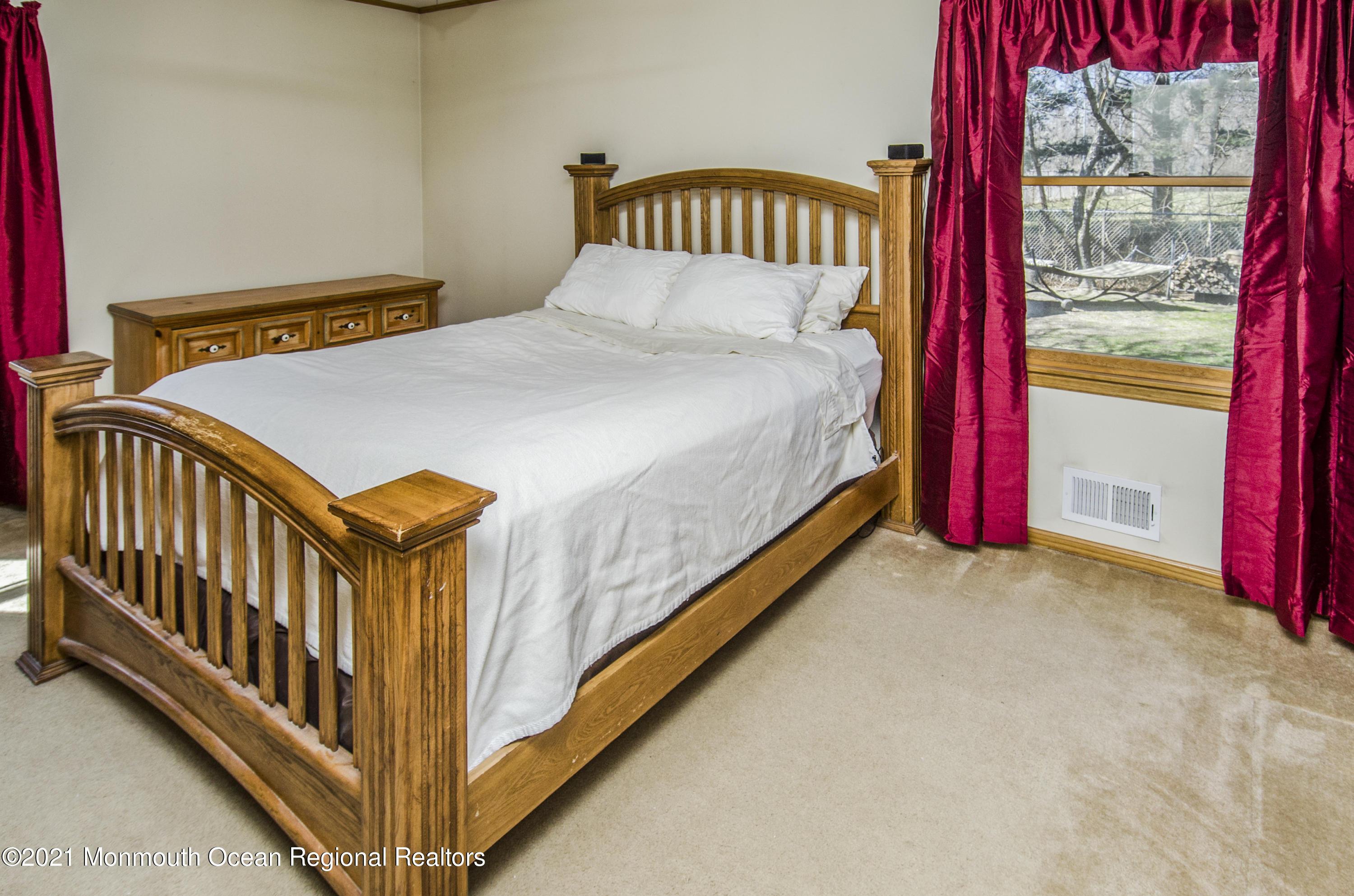 58 Pinewood Drive Brick, NJ 08724 - Photo 20 of 30 a bedroom with bed and a window