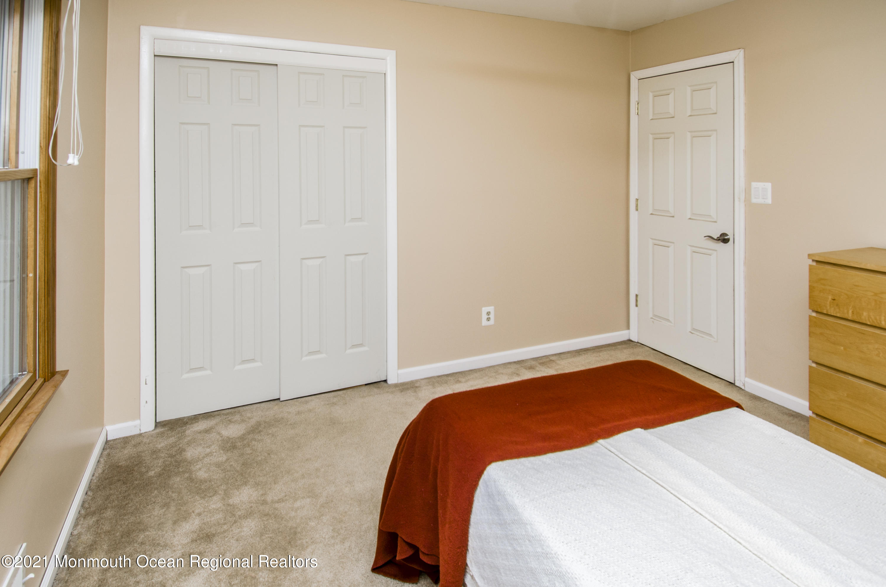 58 Pinewood Drive Brick, NJ 08724 - Photo 24 of 30 a bedroom with a bed and a window