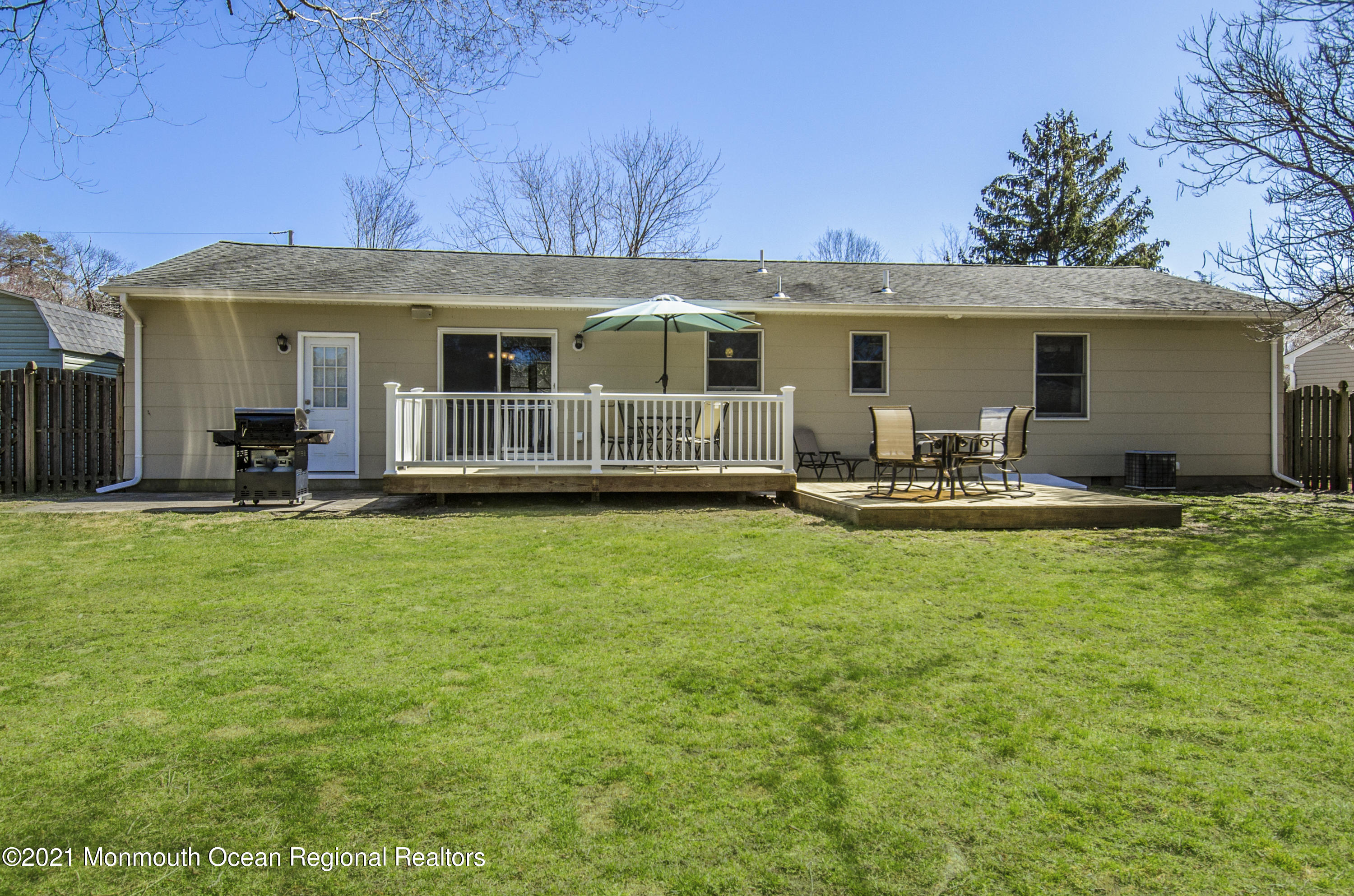 58 Pinewood Drive Brick, NJ 08724 - Photo 27 of 30 a view of a house with backyard and porch
