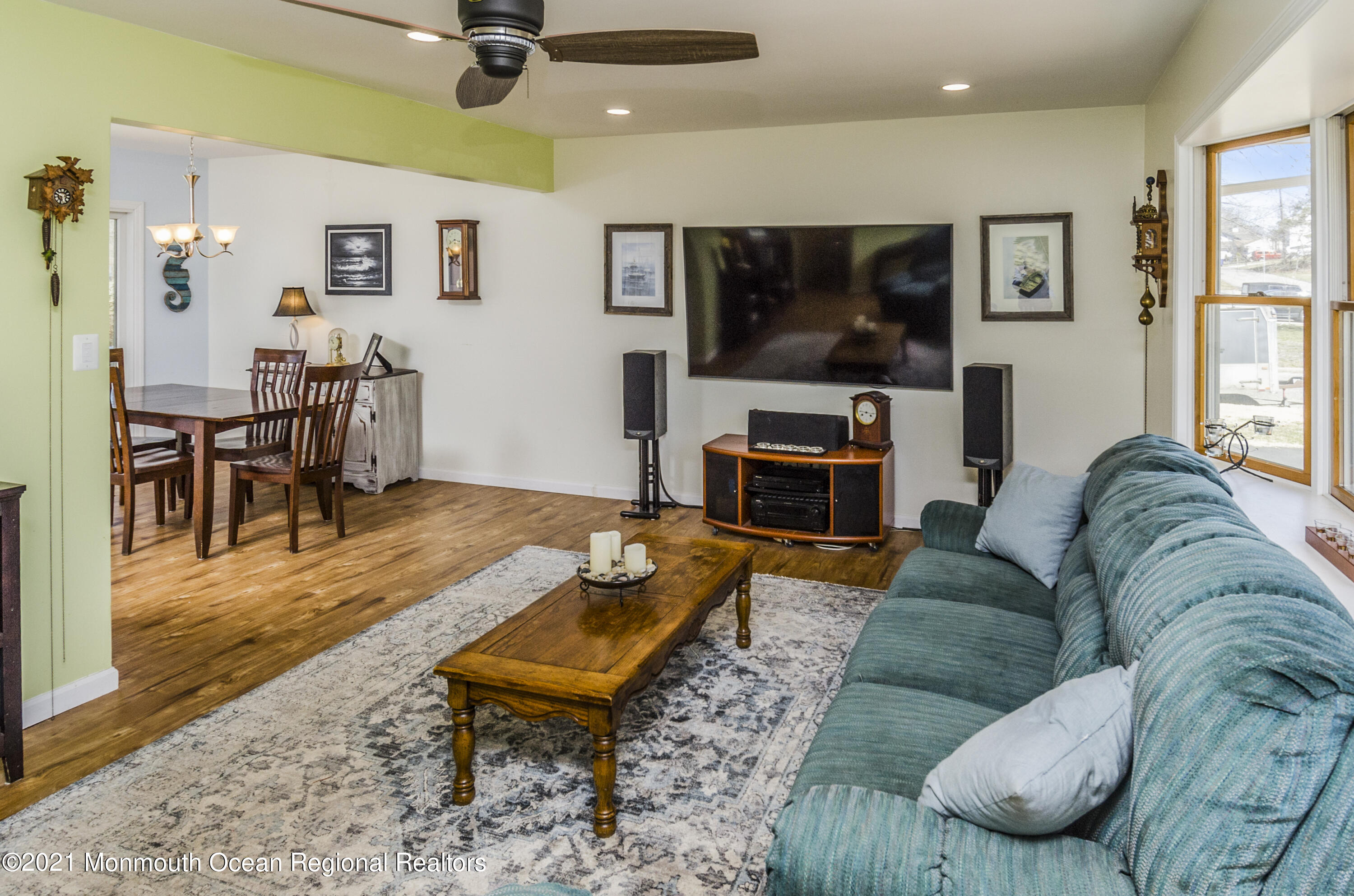 58 Pinewood Drive Brick, NJ 08724 - Photo 8 of 30 a living room with furniture and a flat screen tv