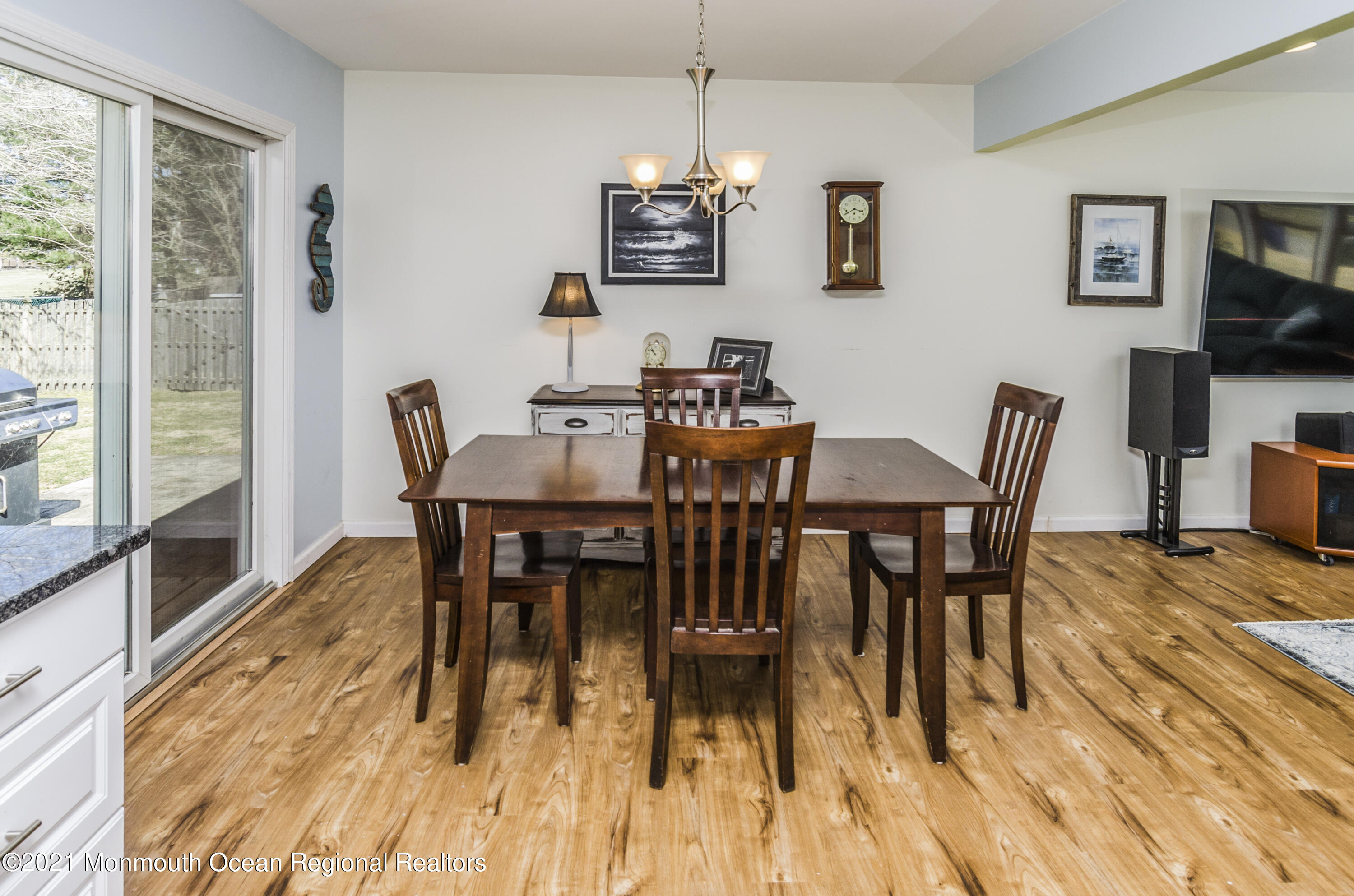 58 Pinewood Drive Brick, NJ 08724 - Photo 10 of 30 a view of a dining room with furniture window and wooden floor