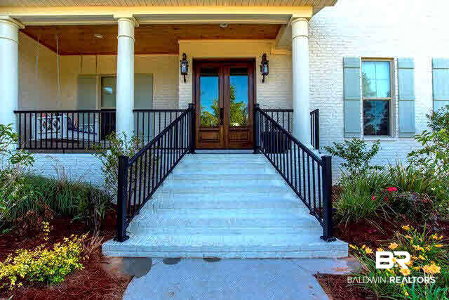 32576 Whimbret Way Daphne, AL 36527 - Photo 2 of 25 The Beauty Begins Before you get to the Front door with Painted Brick, Iron Rails, Double Front Doors and Bevlor Gas Lanterns