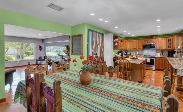 a view of a dining hall with many windows