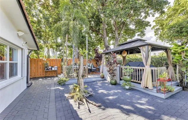 a garden view with a seating space