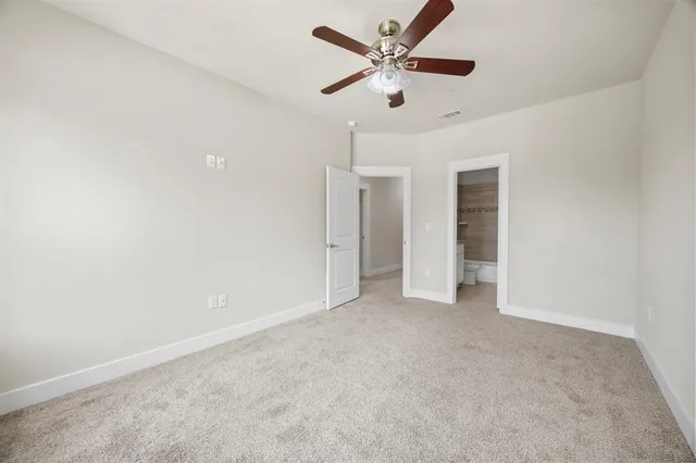a view of a backyard with a table and chairs