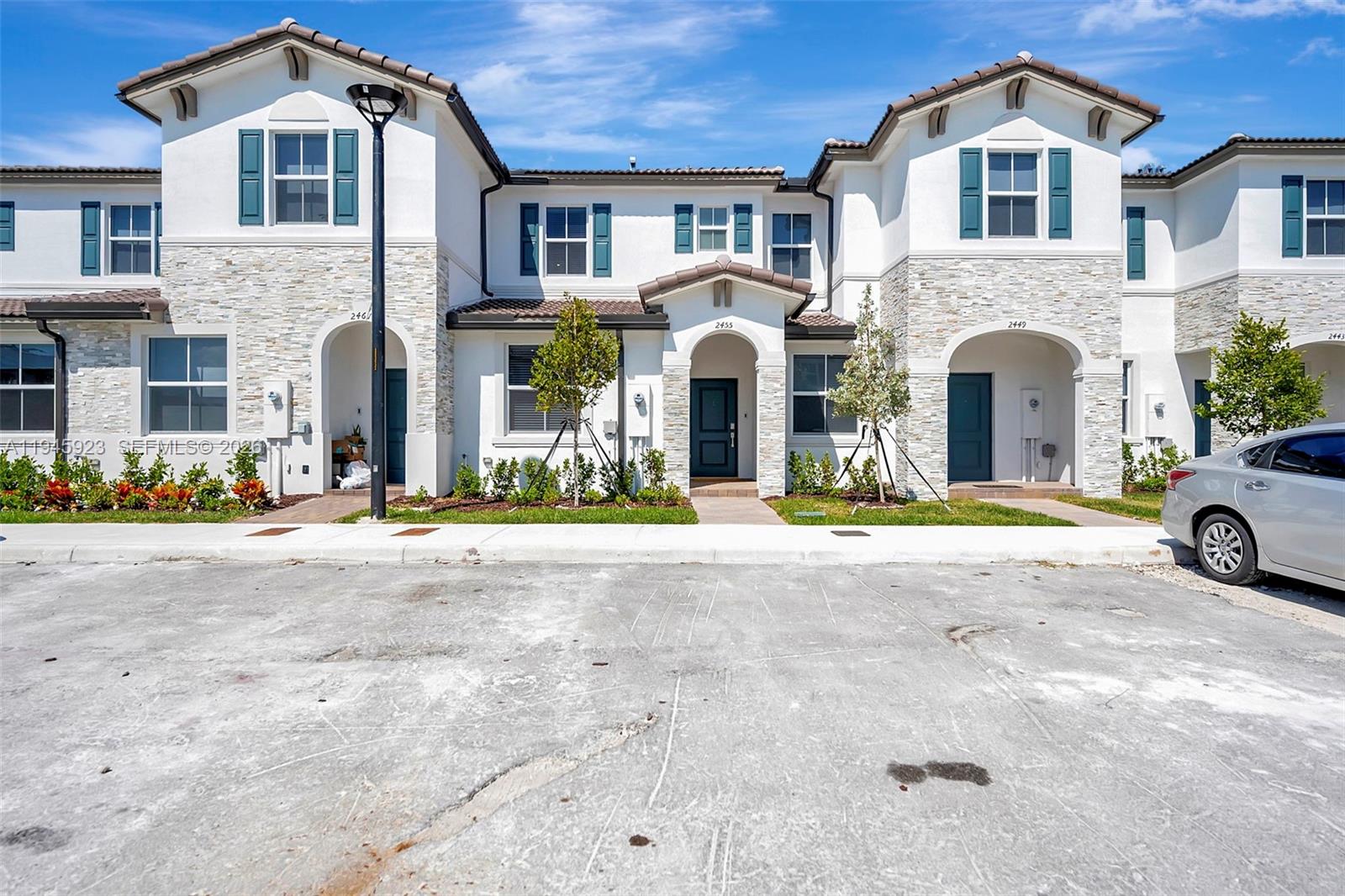 a front view of multiple houses