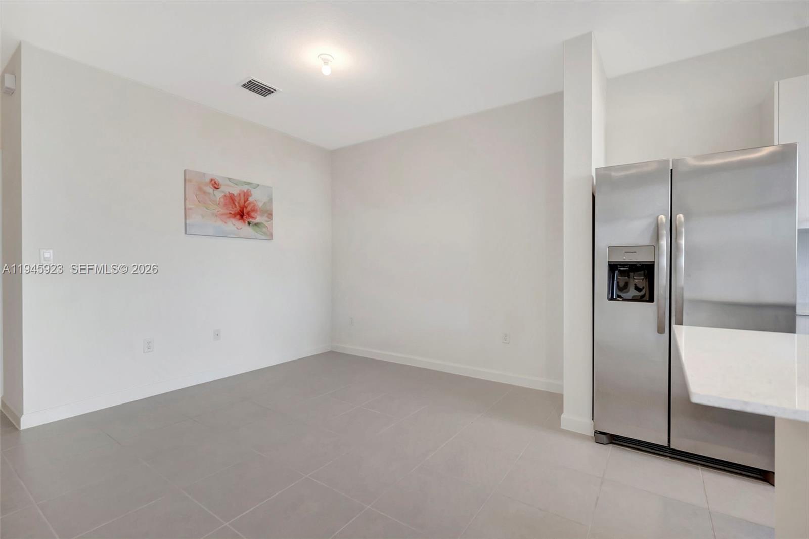 2455 Northwest 119th Street Miami, FL 33167 - Photo 12 of 38 a view of an empty room