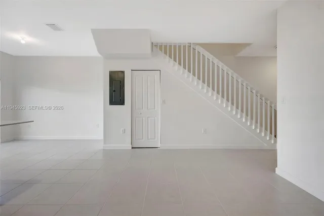 a view of an entryway with staircase