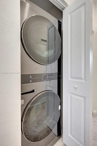 a view of a backyard with potted plants