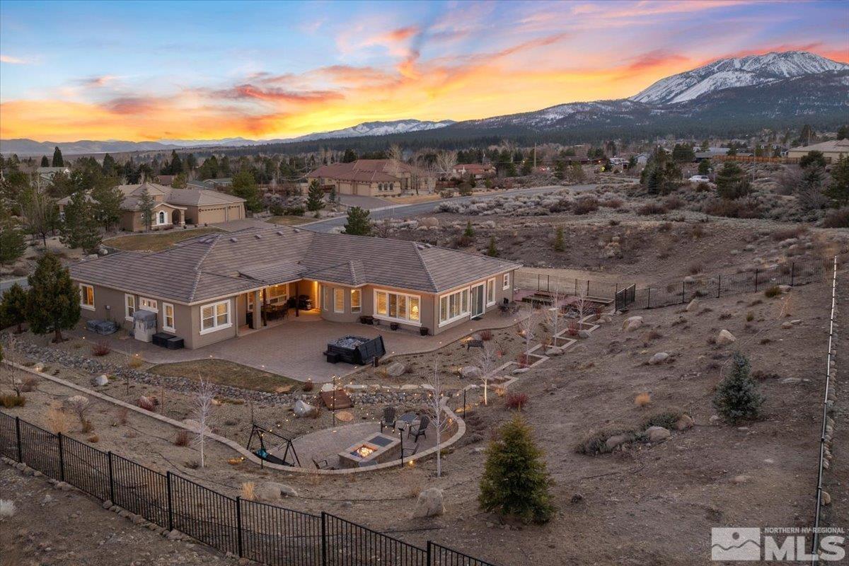 15185 Chateau Avenue Reno, NV 89511 - Photo 17 of 39 an aerial view of residential houses with outdoor space