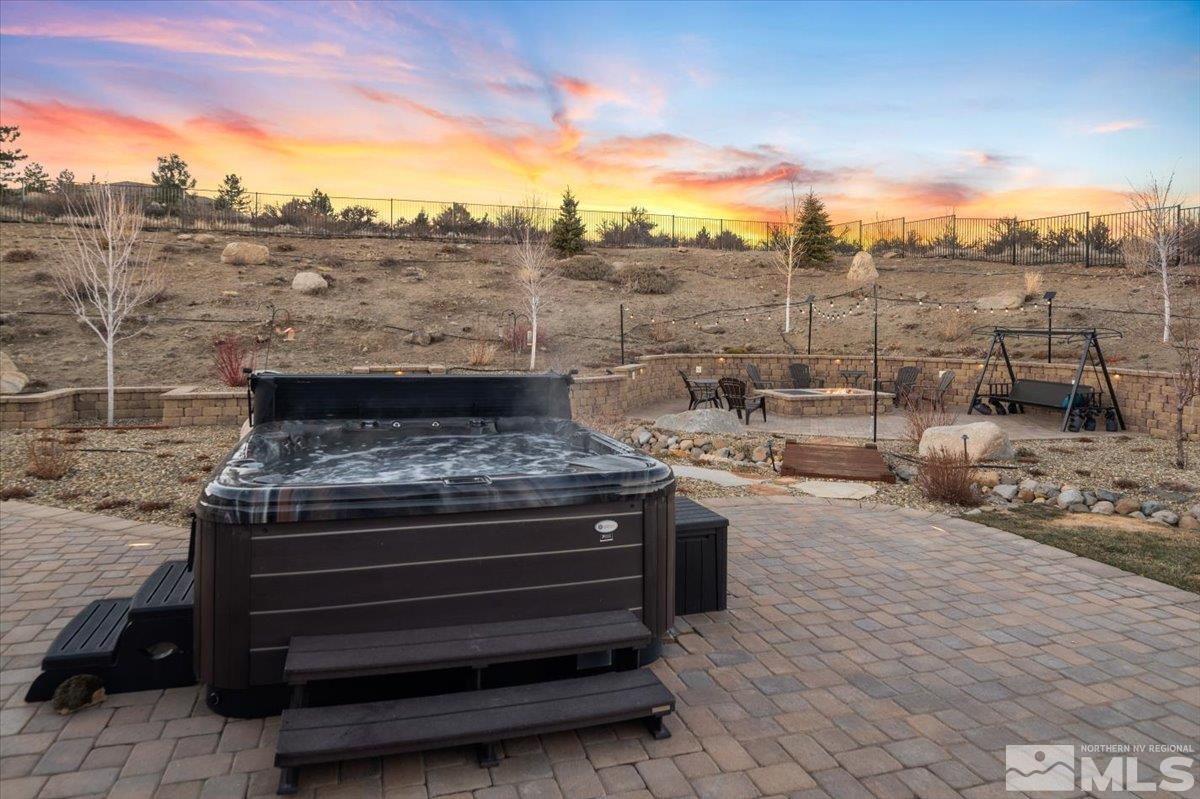 15185 Chateau Avenue Reno, NV 89511 - Photo 2 of 39 a view of a terrace with outdoor seating and city view