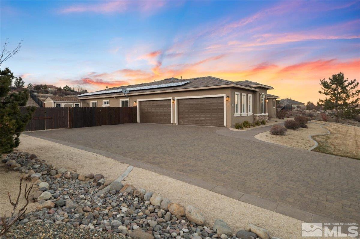 15185 Chateau Avenue Reno, NV 89511 - Photo 23 of 39 a view of a house with a yard